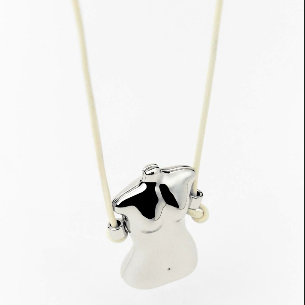 BUST CHARM NECKLACE